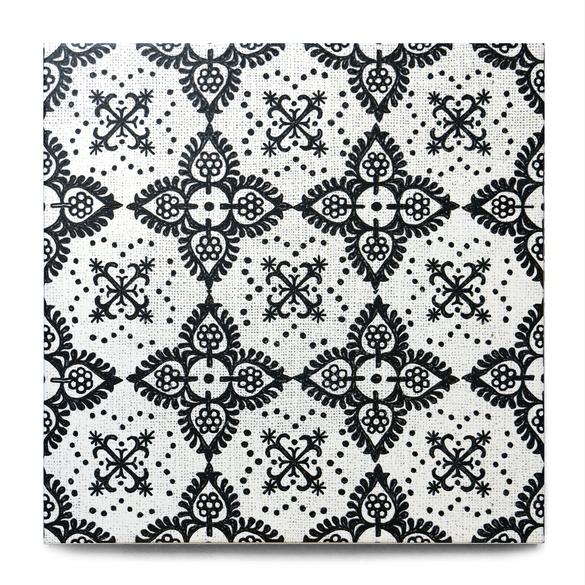 A square decorative porcelain tile featuring a black and white damask pattern on a textured off-white background, shown against a plain white backdrop.